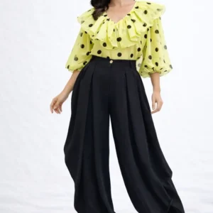 cute bright yellow blouse with black polka dots